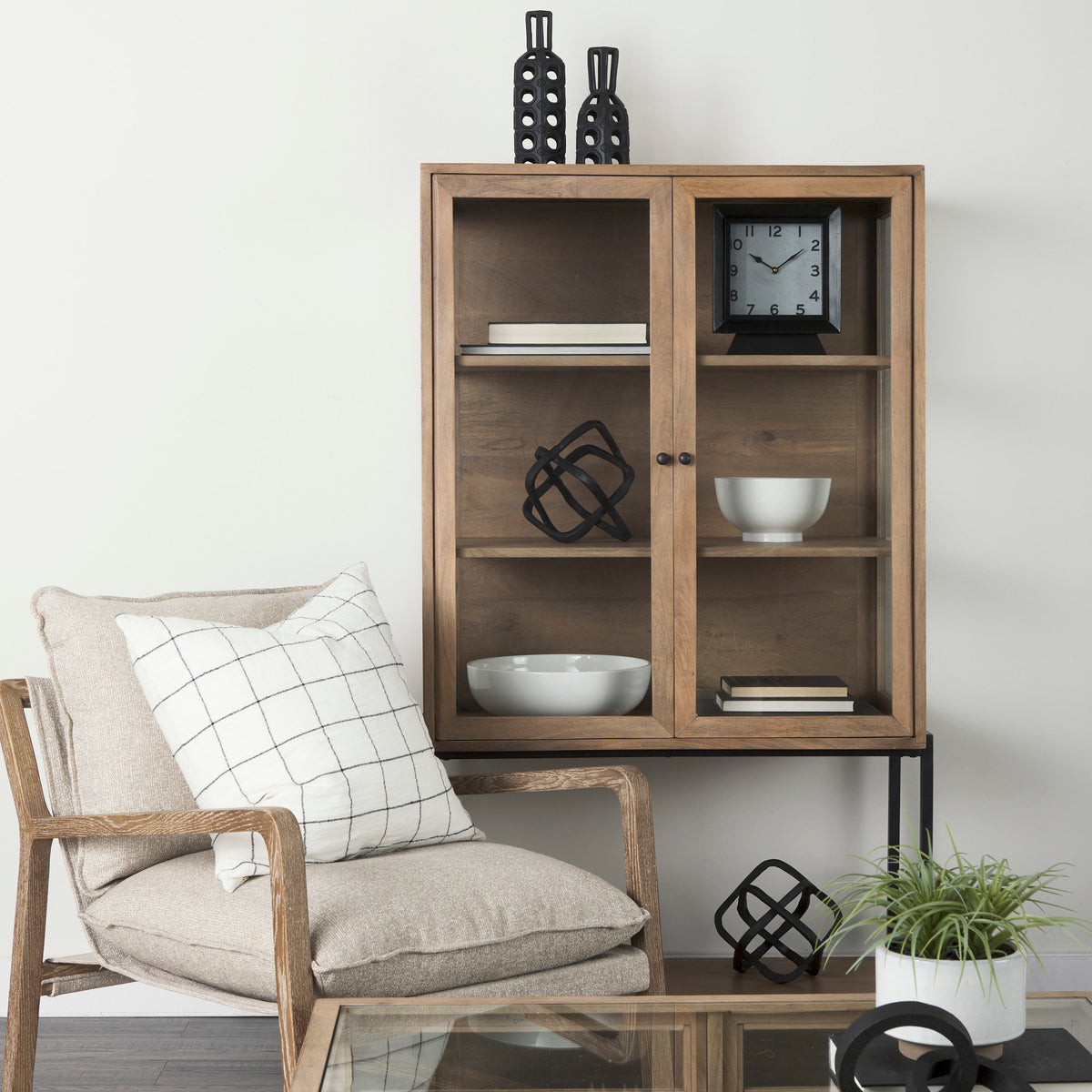 Arelius light wood display cabinet in room setting