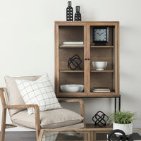 Arelius light wood display cabinet in room setting