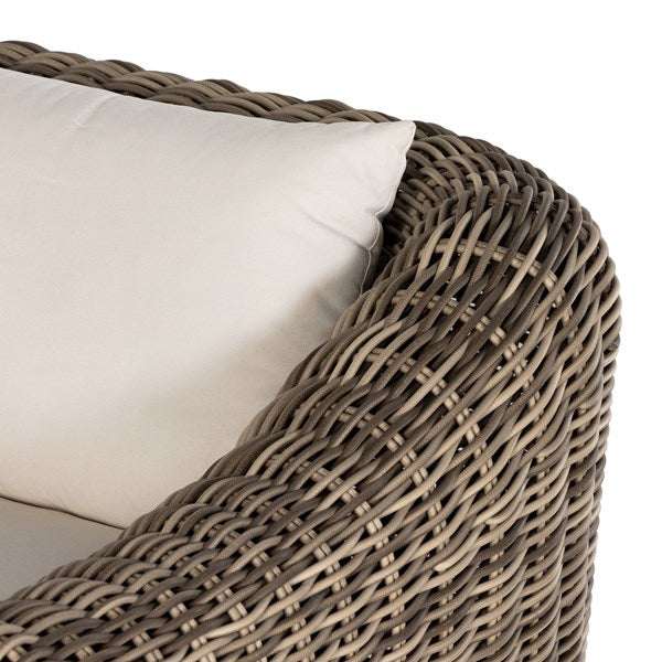 Brown Outdoor chaise lounge with white cusshion 