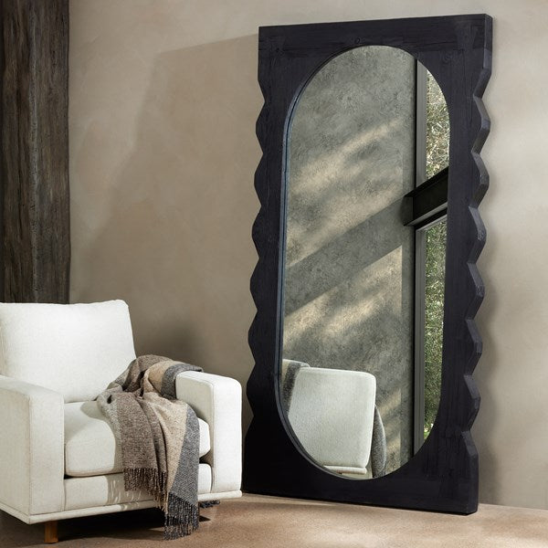 oversize-high-quality-mirror-black-wood-frame-leaning-on-wall