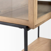 detailed view of the arelius light wood cabinet base and black metal 